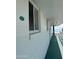Well-lit hallway with ocean views, leading to residential unit with unit number sign at 2727 N Atlantic Ave # 602, Daytona Beach, FL 32118