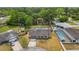 Charming single-story home with a private backyard pool and mature trees, perfect for outdoor living at 290 Greenwood Cir, Ormond Beach, FL 32174