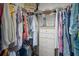 Walk-in closet with an array of organized clothing, shelves, and a small dresser for storage at 290 Greenwood Cir, Ormond Beach, FL 32174