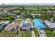 Aerial view showcasing neighborhood homes with well-maintained lawns, swimming pool, and ample parking at 342 Euclid Ave, Daytona Beach, FL 32118