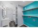 Bathroom featuring a modern sink, washer and dryer hookups, and well lit shower at 342 Euclid Ave, Daytona Beach, FL 32118