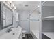Bathroom with a single sink vanity and shower-tub combo at 342 Euclid Ave, Daytona Beach, FL 32118