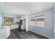 Bright kitchen with white cabinets, granite countertops, and stainless appliances at 342 Euclid Ave, Daytona Beach, FL 32118