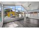 Spacious sunroom offering great views of the pool, backyard and plenty of natural light at 342 Euclid Ave, Daytona Beach, FL 32118