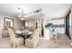 Dining space near kitchen featuring stylish mirrored wall decor at 3743 S Atlantic Ave # 11D, Daytona Beach Shores, FL 32118