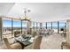 Bright living room with floor-to-ceiling windows and scenic views at 3743 S Atlantic Ave # 11D, Daytona Beach Shores, FL 32118