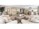 Inviting living room connected to dining area, showcasing a modern design at 3743 S Atlantic Ave # 11D, Daytona Beach Shores, FL 32118