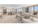 Spacious open-concept living room and dining area with stunning ocean views at 3743 S Atlantic Ave # 11D, Daytona Beach Shores, FL 32118