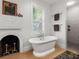 Elegant bathroom featuring a freestanding tub and a separate glass-enclosed shower at 37918 N County Road 44A, Eustis, FL 32736