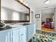 Stylish bathroom features a double sink vanity with colorful tile flooring and a large mirror at 37918 N County Road 44A, Eustis, FL 32736