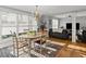 Bright breakfast nook area featuring hardwood floors and natural light at 37918 N County Road 44A, Eustis, FL 32736