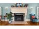 Ornate fireplace with a detailed mantle and decor on top at 37918 N County Road 44A, Eustis, FL 32736