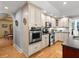 Bright kitchen with stainless steel appliances, custom cabinets, and access to the breakfast nook at 37918 N County Road 44A, Eustis, FL 32736