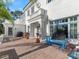 Expansive brick paver patio with white exterior and views of the side yard at 37918 N County Road 44A, Eustis, FL 32736