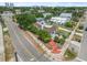 Aerial view of a charming home with mature trees, a brick walkway and neighborhood views at 401 N Oleander Ave, Daytona Beach, FL 32118