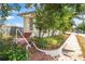 Charming home featuring a brick staircase, mature trees, and a white picket fence at 401 N Oleander Ave, Daytona Beach, FL 32118