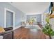 Spacious living room with hardwood floors, neutral decor, and lots of natural light at 401 N Oleander Ave, Daytona Beach, FL 32118