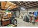 The barn has a wooden ceiling frame. Lots of miscellaneous items are inside the barn at 5865 Ross Creek Rd, Lakeland, FL 33810