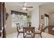 Bright dining area with a glass table and views of the pool at 5865 Ross Creek Rd, Lakeland, FL 33810