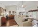 Inviting living room with a piano, ceiling fan and plenty of natural light at 5865 Ross Creek Rd, Lakeland, FL 33810