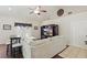 Comfortable living room with a large sectional, hardwood floors, and built-in media center at 5865 Ross Creek Rd, Lakeland, FL 33810