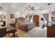 Elegant main bedroom with a tray ceiling and stylish furnishings at 5865 Ross Creek Rd, Lakeland, FL 33810