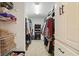 Walk-in closet with shelving and storage space for clothes, accessories and personal items at 5865 Ross Creek Rd, Lakeland, FL 33810