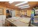 This spacious workshop features multiple work areas and storage shelves at 5865 Ross Creek Rd, Lakeland, FL 33810