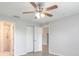 This light and airy bedroom has a ceiling fan, closet and ensuite bathroom at 613 Clairmont Ln, South Daytona, FL 32119