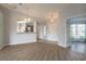 Foyer showing kitchen, front door, and an open-concept floor plan at 613 Clairmont Ln, South Daytona, FL 32119