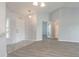 Inviting entry way that offers views into the kitchen and additional rooms, and unique tile flooring at 613 Clairmont Ln, South Daytona, FL 32119