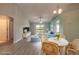 Bright living room furnished with a sofa, chairs, and stylish decor at 613 Clairmont Ln, South Daytona, FL 32119