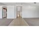 Bright hallway featuring tile flooring with an inviting entrance and arched doorways at 881 Westline Ave, Deltona, FL 32725
