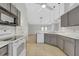 Spacious kitchen with stainless steel appliances, ample counter space, and modern cabinetry at 881 Westline Ave, Deltona, FL 32725