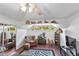 Sitting area with comfortable chairs, natural light, and interesting architectural details at 1 Crooked Bridge Way, Ormond Beach, FL 32174
