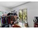 Brightly lit walk in closet with window and desk at 1 Crooked Bridge Way, Ormond Beach, FL 32174