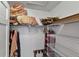 Functional closet with wire shelving for storage and clothing racks for hanging garments at 1 Crooked Bridge Way, Ormond Beach, FL 32174