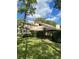 Charming single-story home with well-maintained landscaping and mature trees in a tranquil setting at 1 Crooked Bridge Way, Ormond Beach, FL 32174