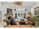 Elegant living room features fireplace, high ceilings, and plenty of natural light at 1 Crooked Bridge Way, Ormond Beach, FL 32174