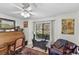 Bright office with a window and desk, chair, exercise bike and a decorative rug at 1 Crooked Bridge Way, Ormond Beach, FL 32174