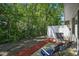 Relaxing backyard with patio, lawn chairs, and privacy fence at 1502 Deer Springs Rd, Port Orange, FL 32129