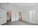 Bedroom with multiple closets and a view to the second floor at 1502 Deer Springs Rd, Port Orange, FL 32129
