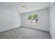 Bedroom with closet and window looking to complex at 1502 Deer Springs Rd, Port Orange, FL 32129