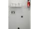 Laundry room with water and dryer hookups, shelving and fire extinguisher at 1502 Deer Springs Rd, Port Orange, FL 32129