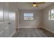 Bright bedroom with hardwood floors, a ceiling fan, and lots of natural light at 1744 Valencia Ave, Ormond Beach, FL 32174
