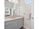Bathroom vanity and sink with cabinet storage and mirror at 1766 Roscoe Turner Trl, Port Orange, FL 32128
