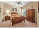 Cozy bedroom with wooden furnishings and a warm ambiance at 1766 Roscoe Turner Trl, Port Orange, FL 32128