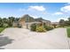 Beautiful home with lush landscaping and a spacious driveway leading to the garage at 1766 Roscoe Turner Trl, Port Orange, FL 32128