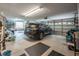 Large three car garage with multiple access doors and natural light at 1766 Roscoe Turner Trl, Port Orange, FL 32128