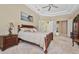 Comfortable main bedroom with ample space and ensuite bathroom at 1766 Roscoe Turner Trl, Port Orange, FL 32128